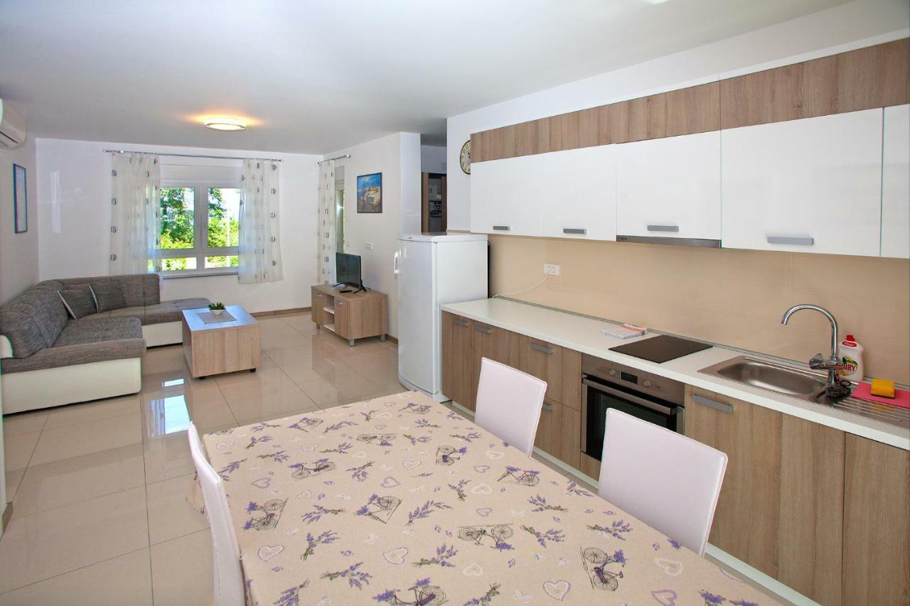Apartments Maslina II Нивице Екстериор снимка